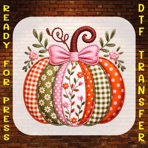 May include: A colorful pumpkin design with a pink bow and stem, featuring various patterns like gingham, polka dots, and floral embroidery. The image is labeled "READY FOR PRESS" and "DTF TRANSFER".