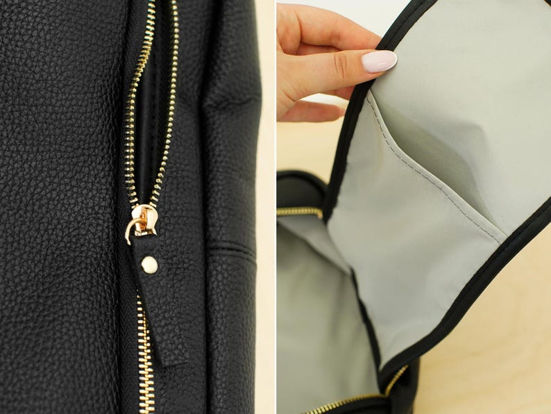 May include: A black backpack with a textured, pebbled surface and a gold-toned metal zipper. The interior is lined with a light gray fabric and features an open slip pocket. The exterior zipper pull is made of matching black material.