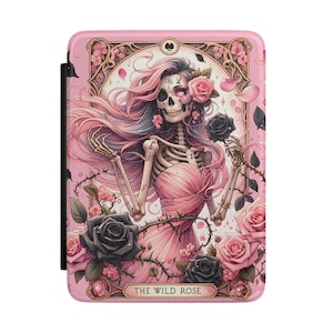 May include: A rectangular e-reader case featuring a pink background with a skeleton figure wearing a pink dress and long pink hair. The skeleton holds a black rose surrounded by pink and black roses, thorny vines, and the text THE WILD ROSE.