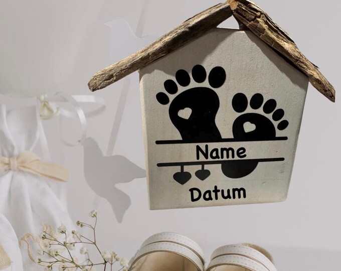 Christening gift. Decorative house with a Baltic Sea driftwood roof, decorated with beach finds from the Baltic and North Seas.