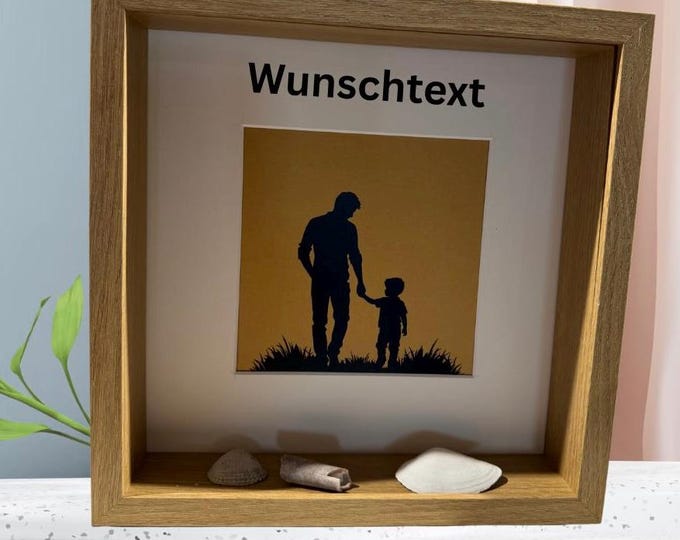Birthday present from my son. Picture frame with a plotter motif and personalized text. Also available with North Sea beach finds.
