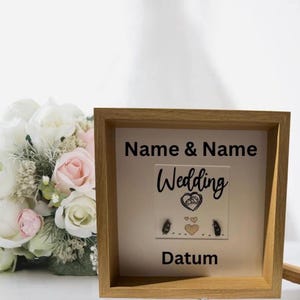 Personalized wedding gifts as a stone picture in a maritime picture frame. Gift for your loved one as a stone picture for a wedding.