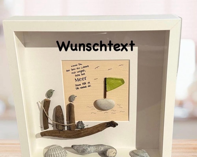 Personalized maritime stone picture with Baltic Sea beach finds. North Sea driftwood wall decoration with saying.