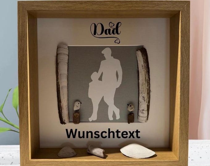 A gift for his father from his son, in a picture frame with a maritime theme. I'd be happy to personalize it, so it becomes a personal gift.