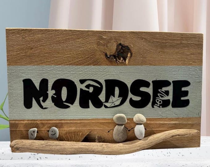 A maritime North Sea sign made of oak wood, decorated with beach finds. A Father's Day gift. Scandinavian-style wall decoration.
