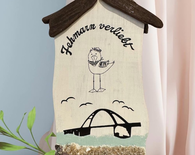 Fehmarn house, wooden house, cottage with maritime decor. North Sea driftwood and Baltic Sea beach finds. Perfect gift for sea lovers.