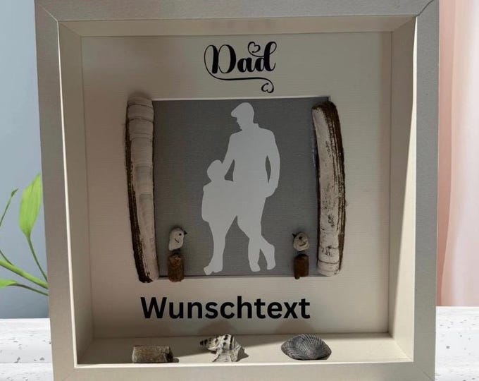 A gift for his father from his son, in a picture frame with a maritime theme. I'd be happy to personalize it, so it becomes a personal gift.
