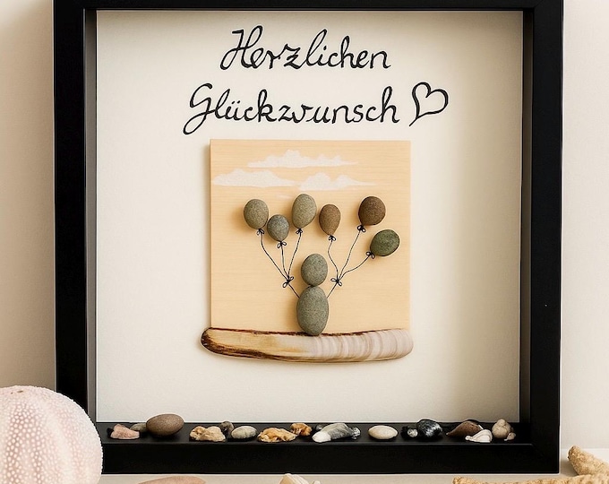Bilder mit Steinen als personalisierter Bilderrahmen 27cm schwarz. Handmade Geschenke mit maritime Deko und Bilder aus Kieselsteinen.