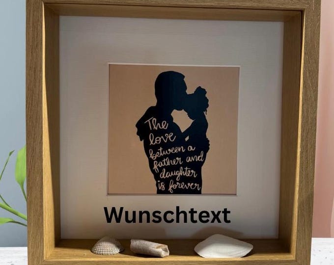A birthday gift for father from daughter. Picture frame with a plotter motif and personalized text. Also available with North Sea beach finds.