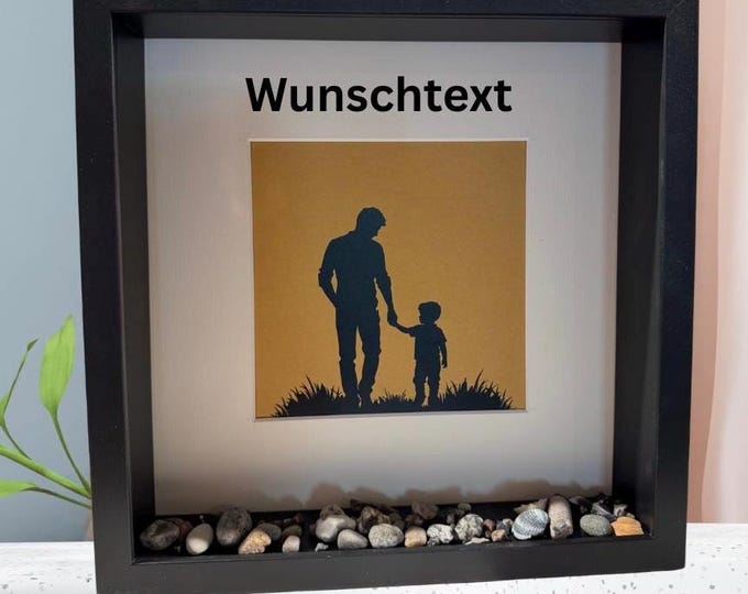 A gift for father's birthday from his son. Picture frame with a plotter motif and personalized text. Also available with North Sea beach finds.