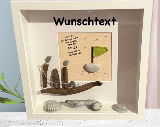 Personalized maritime stone picture with Baltic Sea beach finds. North Sea driftwood wall decoration with saying.