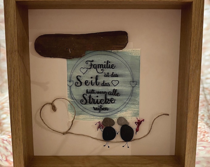 A maritime stone picture featuring Baltic Sea beach finds and North Sea driftwood. A decorative gift for your loved one.