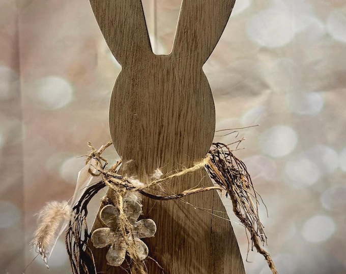 Easter bunny made of wood. For standing. A beautiful Easter decoration.
