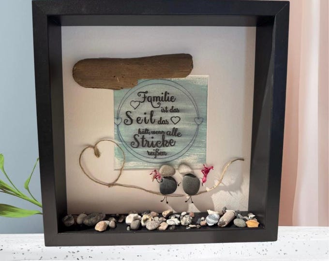 A maritime stone picture featuring Baltic Sea beach finds and North Sea driftwood. A decorative gift for your loved one.