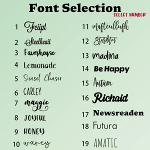 May include: A green background displays a font selection guide. The text "Font Selection" is at the top, with the words "SELECT NUMBER" in red. Nineteen font styles are listed, each with a number and a sample of the font.