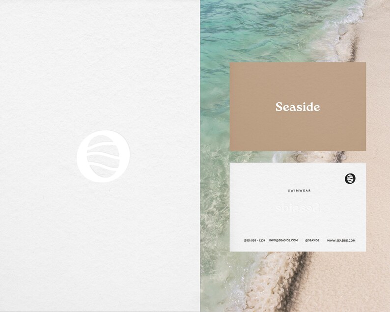 May include: A white business card with the text "Seaside Swimwear" and a logo of a circle with a wave inside. The card also includes contact information: 000-000-1234, info@seaside.com, @seaside, www.seaside.com.