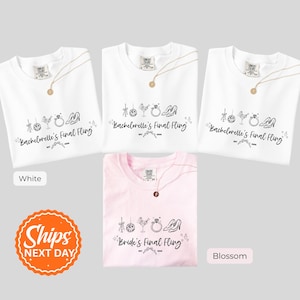 May include: White and pink t-shirts with the text "Bachelorette's Final Fling" and "Bride's Final Fling" in black script. Each shirt has a necklace. The shirts are folded and displayed on a light gray background.