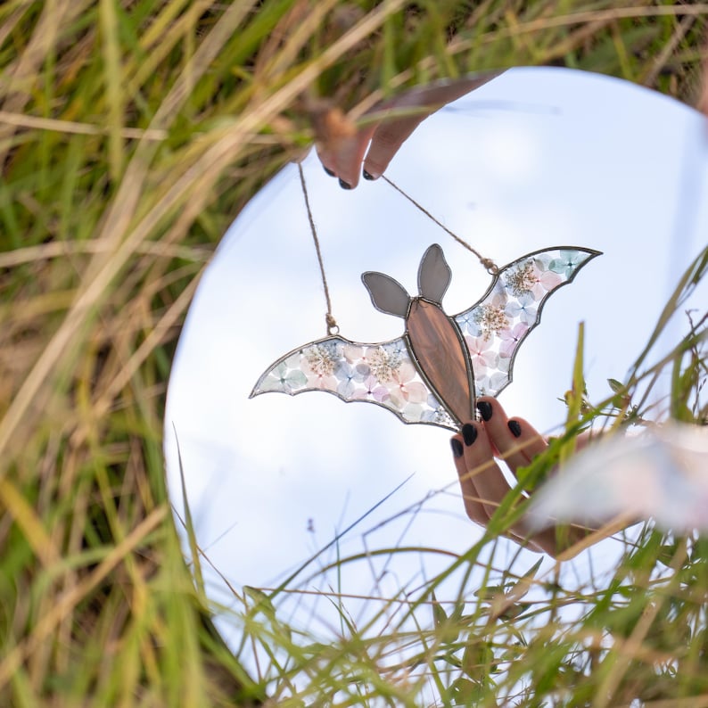 Pastel bat suncatcher with pink and blue flowers, autumn vibes