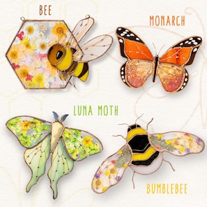 May include: Four decorative insect ornaments: a bee, a monarch butterfly, a luna moth, and a bumblebee. The bee is yellow and black, the monarch is orange and black, the luna moth is green and yellow, and the bumblebee is yellow and black. Each ornament has a floral design.