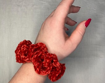 Coletero de ganchillo de terciopelo con forma de fuego