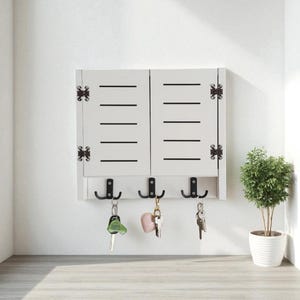 Cubierta decorativa para caja de fusibles hecha a mano: llavero y organizador oculto para paneles eléctricos (35 x 40 cm)