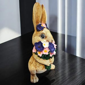 Handmade Rabbit Figurine Holding a Bouquet – Decorative Ornament