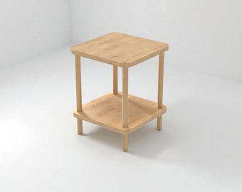 Puede incluir: Una pequeña mesa auxiliar cuadrada de madera con acabado natural. La mesa tiene una superficie superior y un estante inferior, ambos sostenidos por cuatro patas cilíndricas. La mesa mide aproximadamente 46 cm de alto y 41 cm de ancho.