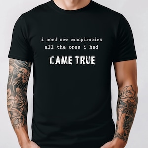 I need a new conspiracy theory, funny conspiracy shirt, Short-Sleeve Unisex T-Shirt