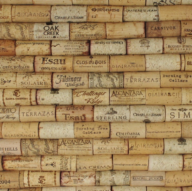 May include: A close-up of a wall made of wine corks. The corks are arranged in a brick pattern and feature various winery logos and names, including "Oak Creek", "Esau", "Terrazass", "Filsinger Vineyard", "Alcantara", "Burning Tree Cellars", "Columbia Winery", "Solaire", "Clos du Bois", "Chateau Jean", "Charles Shaw", "Dia Ranch", "Greg Norman", "Rodney Strong Vineyard", "Sterling", "Tribe of Esau", "Sim", "Kendall Jackson", "La Crema", "HH Hills", and "Just In Time".