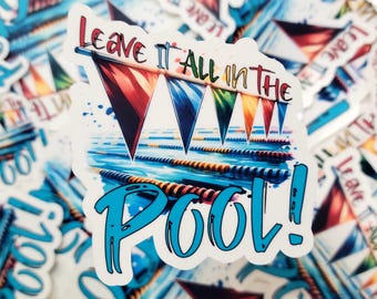 May include: A white sticker with a watercolor illustration of a swimming pool with lane lines and flags. The text "Leave it all in the pool!" is written in blue with a black outline.