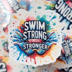4" 'Swim Strong Finish Stronger' in bold, dynamic lettering, designed to inspire swimmers to push through and give their best effort until the very end.