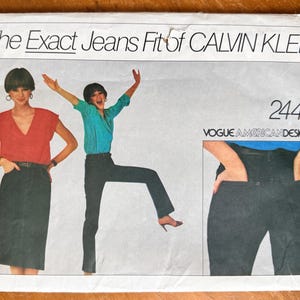 May include: Vintage sewing pattern titled "The Exact Jeans Fit of CALVIN KLEIN" featuring illustrations of women in jeans and tops. The pattern number is 2442, and it is from Vogue American Designer.