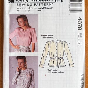 May include: A vintage sewing pattern for a woman's blouse. The pattern features illustrations of the blouse design and includes the text "Busy Woman's Sewing Pattern" and "For McCall's". The size is 22.