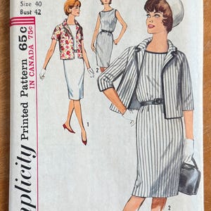 May include: Vintage Simplicity sewing pattern featuring illustrations of women's dresses and jackets. The pattern includes a striped dress with a matching jacket, a floral jacket, and a sleeveless dress. The pattern number is 5318, with a bust size of 42.