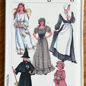 May include: Simplicity sewing pattern featuring costume designs. The package shows illustrations of various costumes, including an angel, a witch, and a pilgrim. The costumes are in different styles and colors, suitable for Halloween or theatrical events.