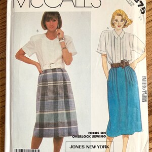 May include: A sewing pattern for a skirt and blouse. The pattern is from McCall's and is for a miss size 12. The pattern includes instructions for overlock sewing. The pattern is from Jones New York.