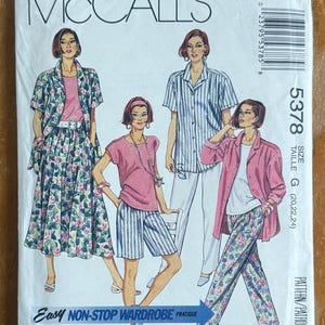 May include: McCall's 5378 sewing pattern envelope for an easy non-stop wardrobe. The illustration shows four outfits including a floral skirt and jacket, a striped shirt and shorts, a striped shirt and pants, and a pink jacket with floral pants.