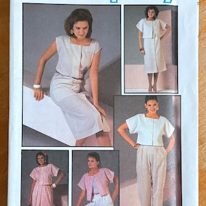 May include: Simplicity sewing pattern featuring various women's outfits. The outfits include a skirt suit, pants suit, and shorts set, all with matching short-sleeved jackets. The pattern number is 6784.