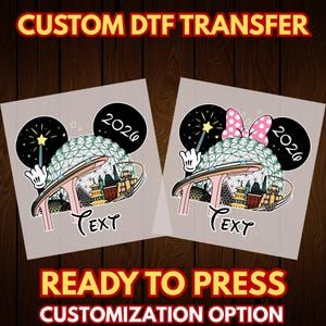 May include: Two DTF transfer designs featuring a stylized Spaceship Earth with Mickey Mouse ears and a bow. The designs include the text "2026" and "Text", with the words "Custom DTF Transfer", "Ready to Press", and "Customization Option" at the top and bottom.
