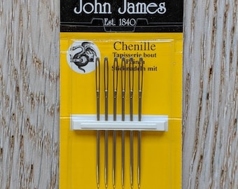 May include: A yellow pack of six size 18 chenille needles by John James, Est. 1840. The pack says "Tapisserie, bout Pin, Sticknadeln mit" and "Finest Quality Needles".