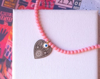 Pink Beaded Necklace with Silver Mystical Heart Charm and Evil Eye