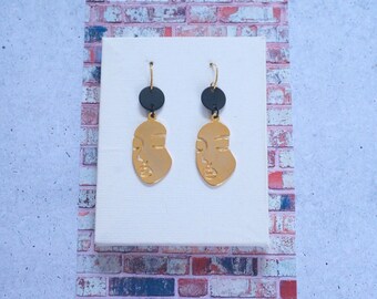 Gold Plated Face Earrings with Black Discs