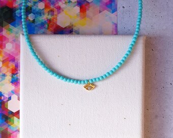 Turquoise Beaded Necklace with Miniture Evil Eye Charm