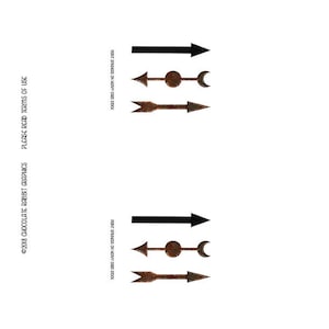 May include: Three metal game spinners with arrow designs. The spinners are rusty brown and black. The text "PRINT SPINNERS ON HEAVY CARD STOCK" is visible on the right side of the image.