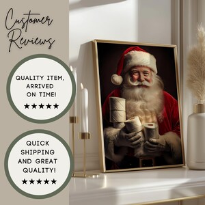 May include: Framed artwork featuring Santa Claus in a red suit and hat, holding rolls of toilet paper. The image has a gold frame and is displayed on a white surface. The text "Customer Reviews" is visible.
