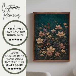 May include: A framed floral print with a dark teal background and a variety of flowers in shades of cream, pink, purple, and yellow. The wooden frame surrounds the artwork. Text on the left side reads "Customer Reviews" and customer feedback.