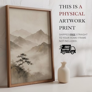 May include: A rectangular wooden frame containing a vertical artwork print of a misty mountain landscape with a prominent tree in the foreground. The text on the right reads: THIS IS A PHYSICAL ARTWORK PRINT SHIPPED FREE STRAIGHT TO YOUR HOME! FRAME NOT INCLUDED.