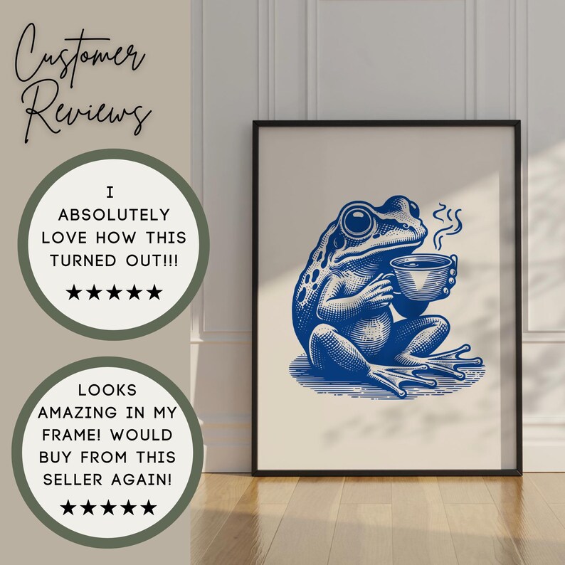 May include: A blue and white illustration of a frog sitting with a cup of coffee. The frog is holding the cup with its left hand and has a relaxed expression on its face. The illustration is in a black frame.