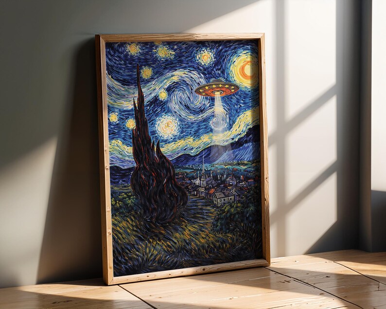 May include: A framed print of a painting depicting a starry night sky with a UFO beaming a light down on a village. The artwork is in the style of Van Gogh, with swirling brushstrokes and vibrant colors. The frame is made of light-colored wood.