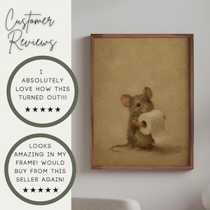 May include: A framed wall art print featuring an oil painting of a small brown mouse holding a roll of white toilet paper against a solid tan background. The artwork is enclosed in a thin brown wooden frame, showcasing a textured brushstroke style.